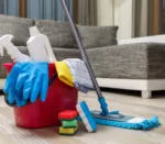 Cleaning,Service.,Bucket,With,Sponges,,Chemicals,Bottles,And,Mopping,Stick.